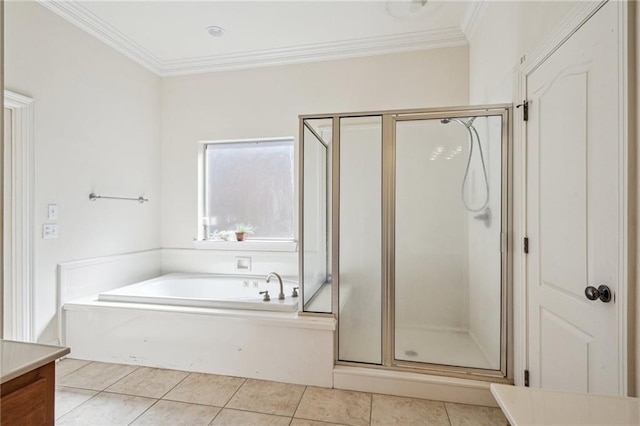 full bathroom with crown molding, a stall shower, a garden tub, and tile patterned floors