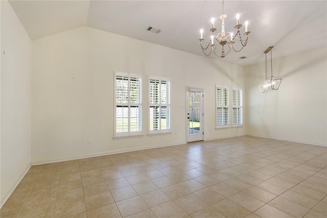 spare room with light tile patterned floors, visible vents, vaulted ceiling, a chandelier, and baseboards