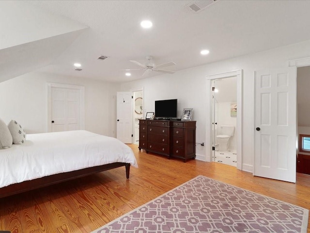 bedroom featuring visible vents, wood finished floors, and recessed lighting