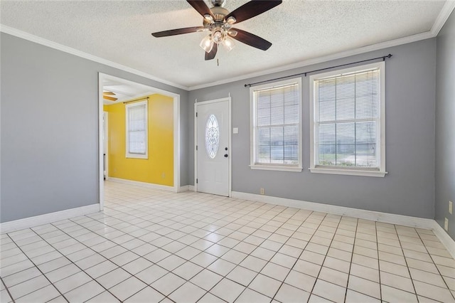 entryway with light tile patterned floors, a textured ceiling, a ceiling fan, baseboards, and crown molding