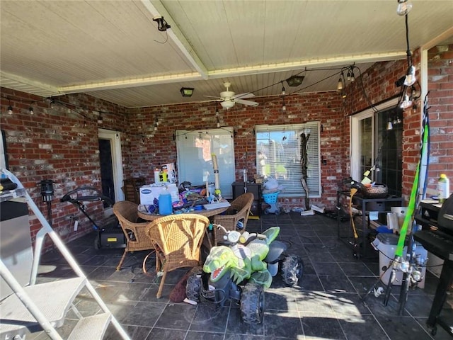 view of patio featuring outdoor dining space and ceiling fan