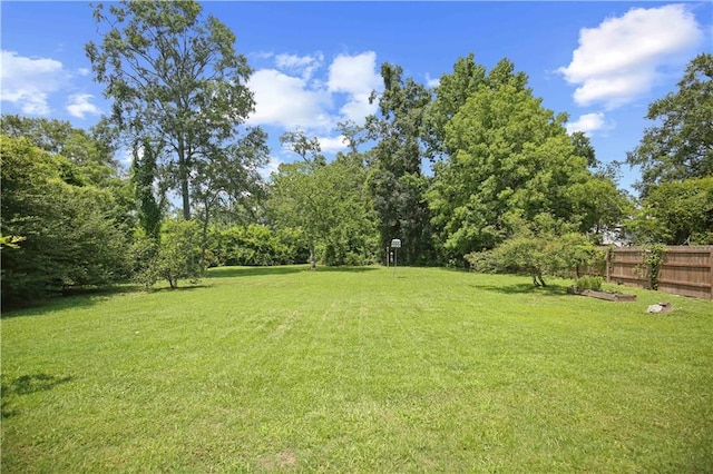 view of yard featuring fence