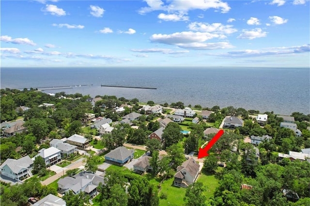 bird's eye view with a water view and a residential view