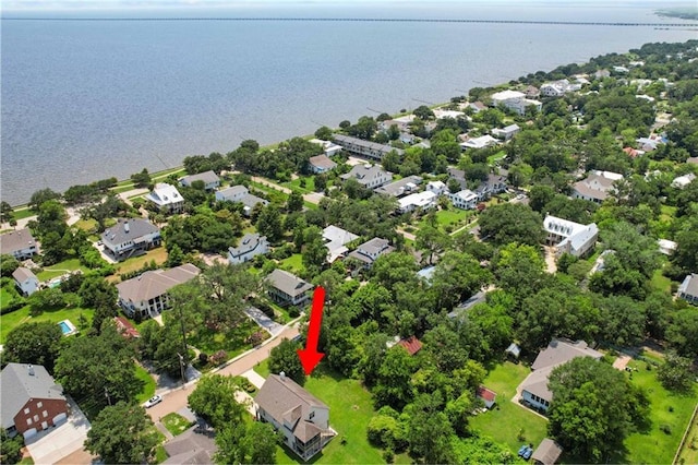 birds eye view of property featuring a water view and a residential view