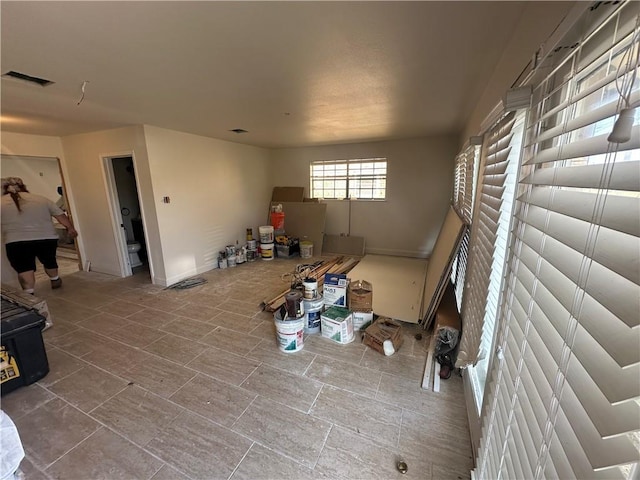 interior space with visible vents and baseboards