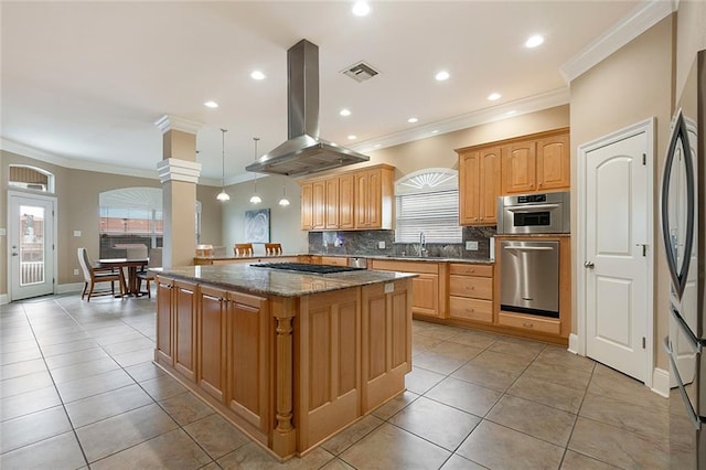 kitchen featuring island range hood, stainless steel appliances, a sink, a kitchen island, and tasteful backsplash