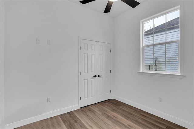 237274 Industry St, New Orleans, LA 70122 - unfurnished room featuring ceiling fan, baseboards, and wood finished floors