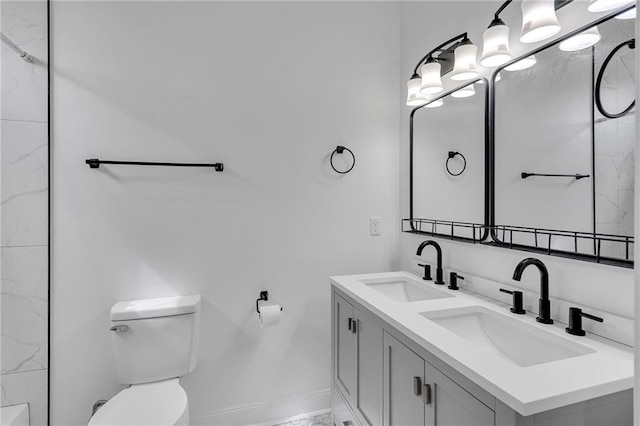 237274 Industry St, New Orleans, LA 70122 - full bath with double vanity, a sink, toilet, and baseboards