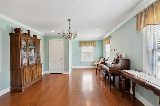 4929 Kawanee Ave, Metairie, LA 70006 - living area featuring a chandelier, baseboards, wood finished floors, ornamental molding, and recessed lighting