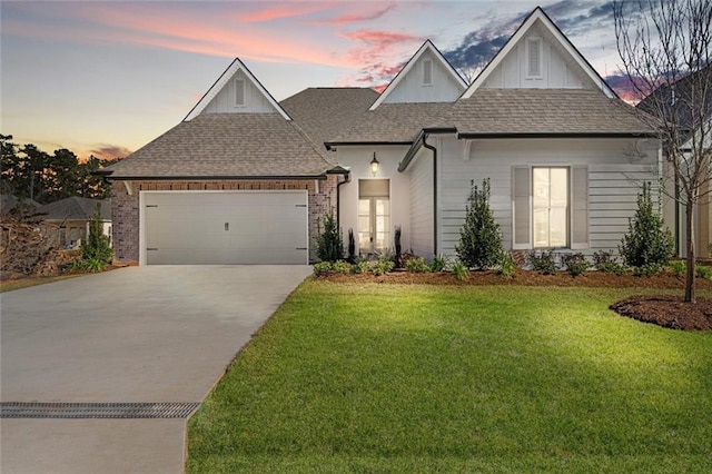 4221 Cypress Point Dr, Covington, LA 70433 - view of front facade with concrete driveway, a garage, a yard, and roof with shingles