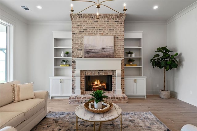 4221 Cypress Point Dr, Covington, LA 70433 - living room featuring ornamental molding, a brick fireplace, and a healthy amount of sunlight