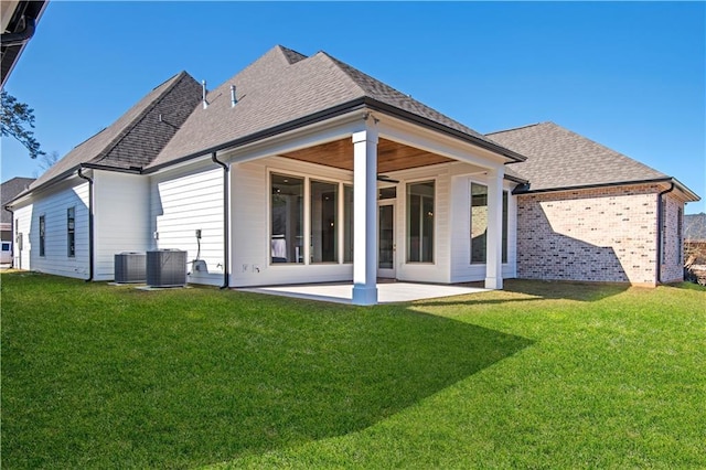 4221 Cypress Point Dr, Covington, LA 70433 - back of property with roof with shingles, a patio, and a yard