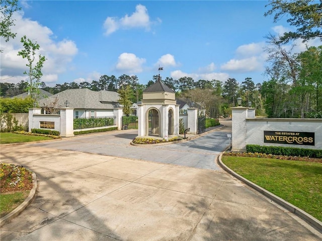 4221 Cypress Point Dr, Covington, LA 70433 - community sign with fence, a gate, and driveway