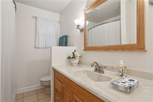 full bath featuring toilet, tile patterned flooring, baseboards, and vanity