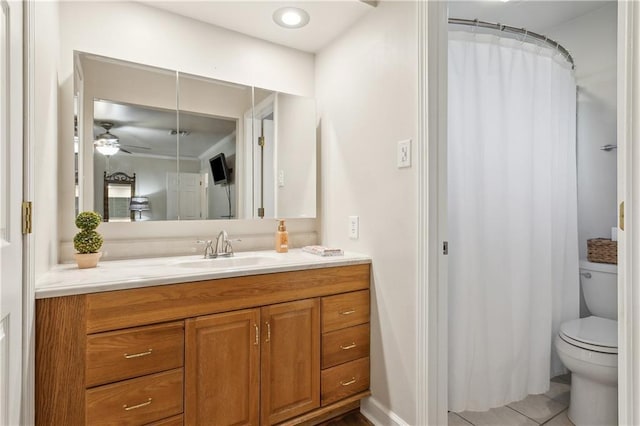 full bath with toilet, a shower with curtain, ceiling fan, tile patterned flooring, and vanity