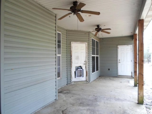 view of patio featuring ceiling fan