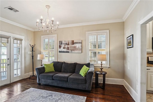 living room with ornamental molding, visible vents, dark wood finished floors, and baseboards