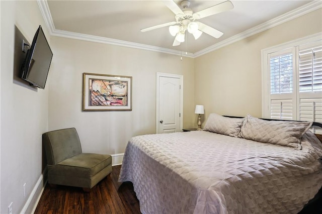 bedroom with crown molding, baseboards, and dark wood-type flooring