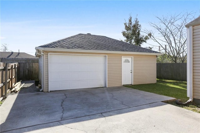 detached garage with fence