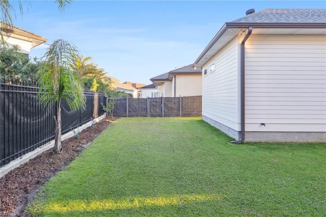 view of yard featuring a fenced backyard