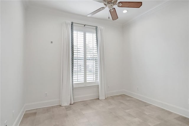 empty room with ceiling fan, ornamental molding, a wealth of natural light, and baseboards