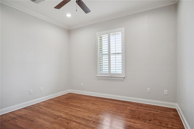 spare room with recessed lighting, wood finished floors, a ceiling fan, baseboards, and ornamental molding