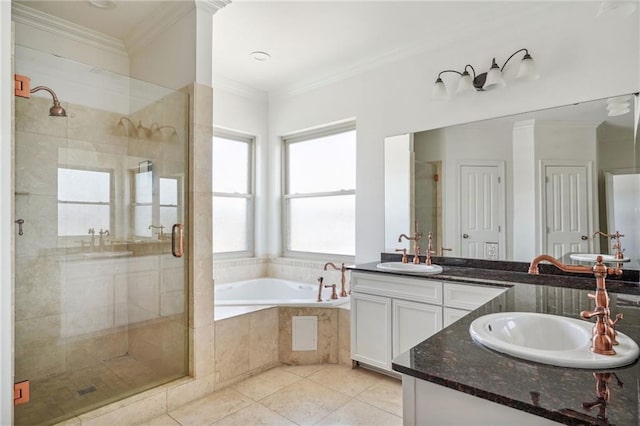 full bath featuring ornamental molding, a sink, a shower stall, and double vanity