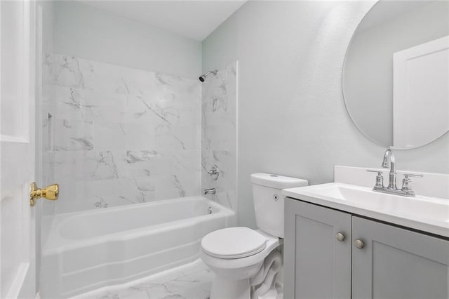 full bathroom featuring bathtub / shower combination, vanity, toilet, and marble finish floor