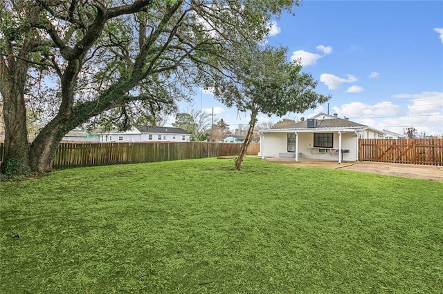 view of yard featuring a patio area and fence private yard