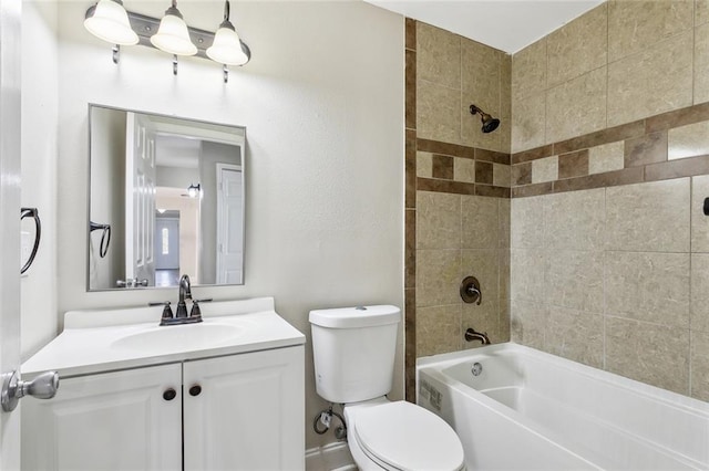 bathroom with toilet, shower / tub combination, and vanity