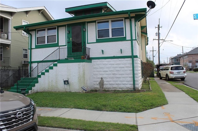 bungalow-style house with stairway