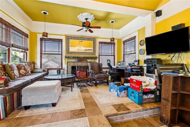 interior space with ceiling fan, a fireplace, wooden ceiling, and crown molding