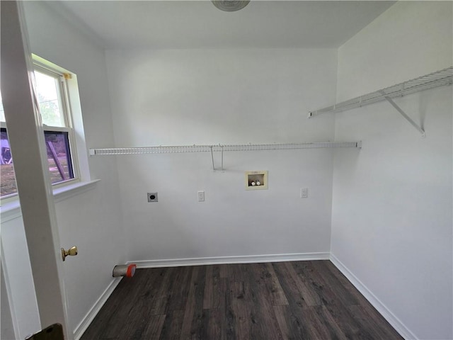 laundry room featuring washer hookup, dark wood-style flooring, electric dryer hookup, laundry area, and baseboards