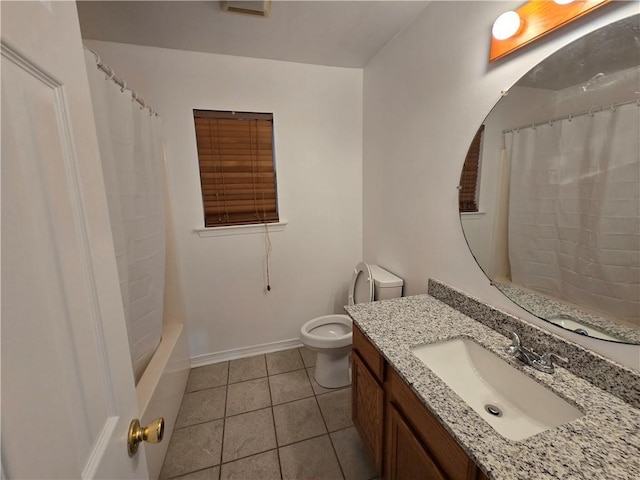 full bath with tile patterned flooring, baseboards, vanity, and toilet