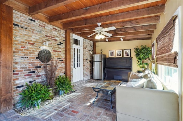 view of patio featuring ceiling fan