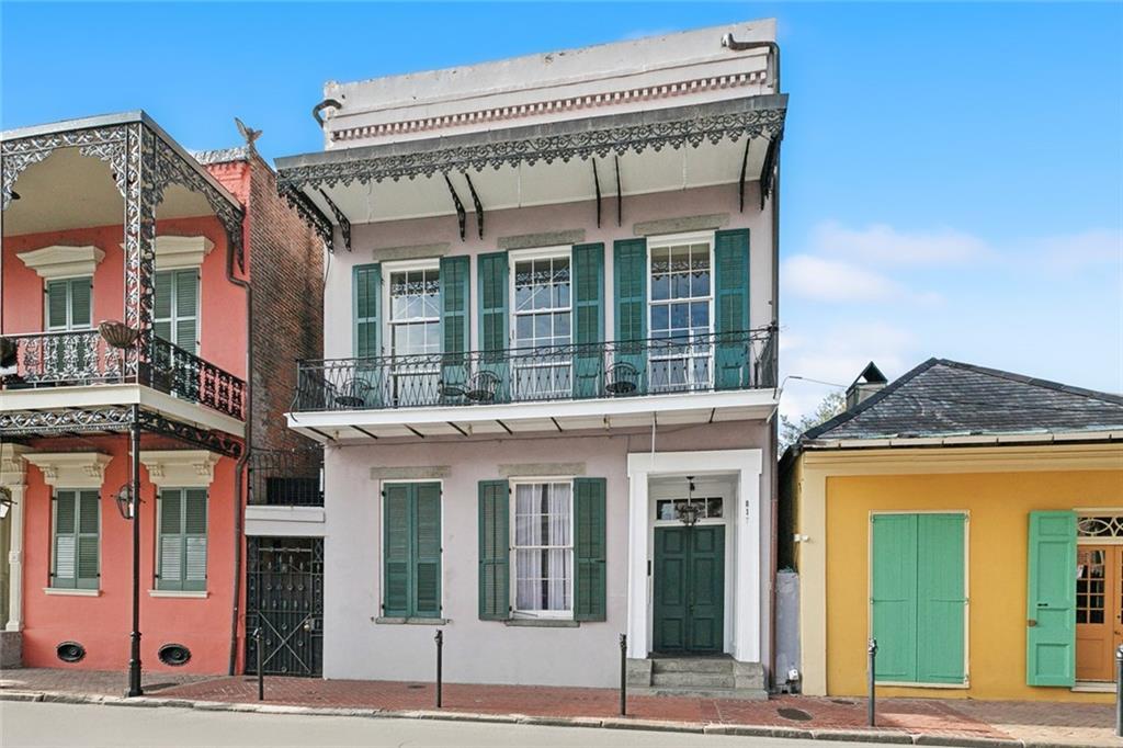 817 Burgundy St Unit A, New Orleans, LA 70116 - view of front of house featuring stucco siding