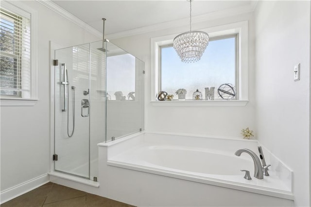 110 Rue Acadian, Belle Chasse, LA 70037 - full bath featuring a notable chandelier, ornamental molding, a stall shower, tile patterned flooring, and a bath