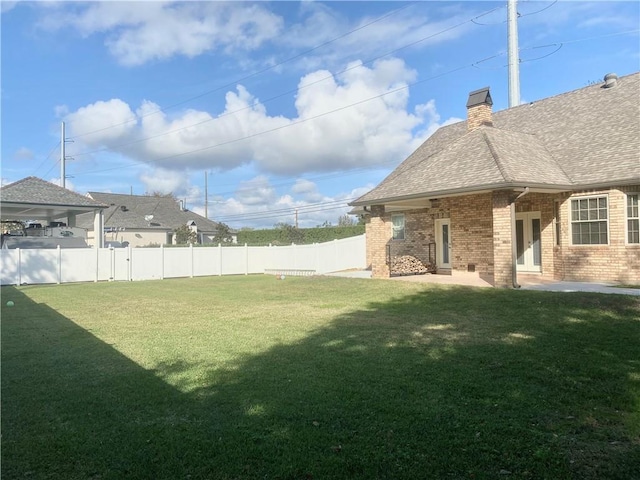 110 Rue Acadian, Belle Chasse, LA 70037 - view of yard with a fenced backyard