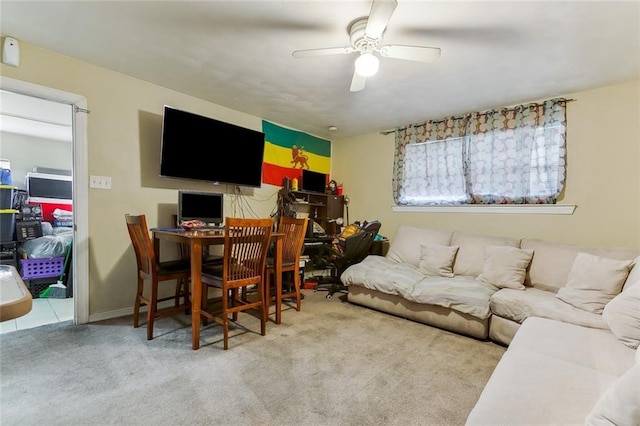 living room featuring ceiling fan and light colored carpet