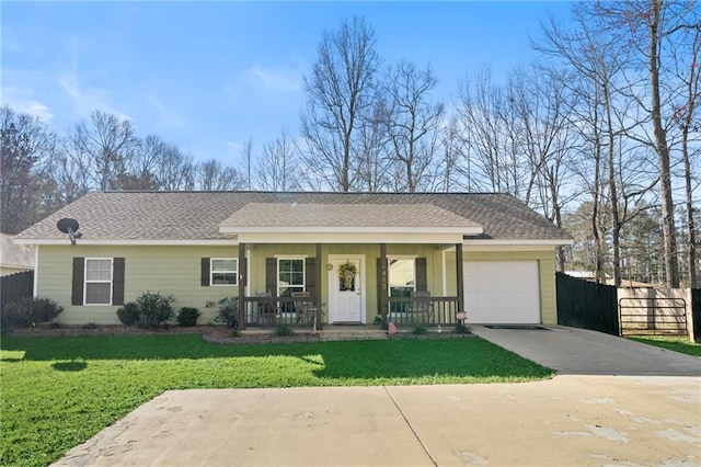 single story home featuring a garage, concrete driveway, fence, a porch, and a front yard