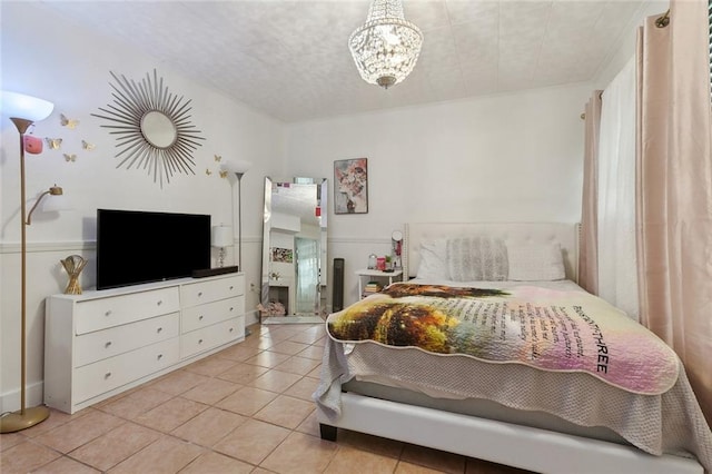 bedroom with light tile patterned flooring