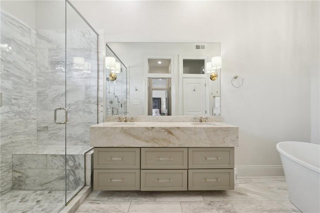 bathroom featuring marble finish floor, visible vents, a sink, and a marble finish shower