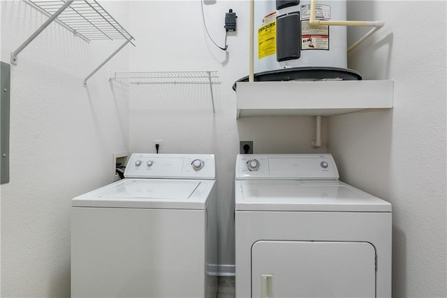 laundry room featuring washer and dryer and laundry area