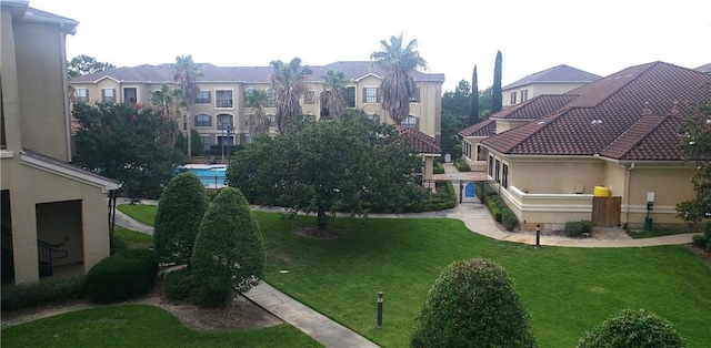 6765 Corporate Blvd Unit 2310, Baton Rouge, LA 70809 - view of community featuring a yard