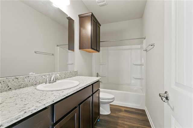 805 Bent Cypress Ln, Slidell, LA 70461 - full bathroom with shower / tub combination, toilet, wood finished floors, vanity, and baseboards