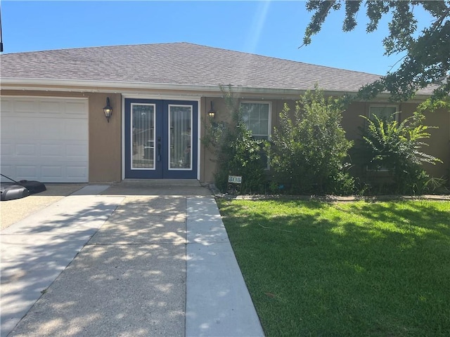 305 Eden Isles Dr, Slidell, LA 70458 - doorway to property featuring a lawn, a shingled roof, and french doors