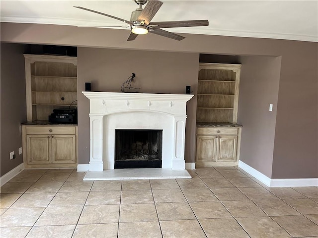 305 Eden Isles Dr, Slidell, LA 70458 - unfurnished living room with crown molding, ceiling fan, light tile patterned floors, and a fireplace with raised hearth
