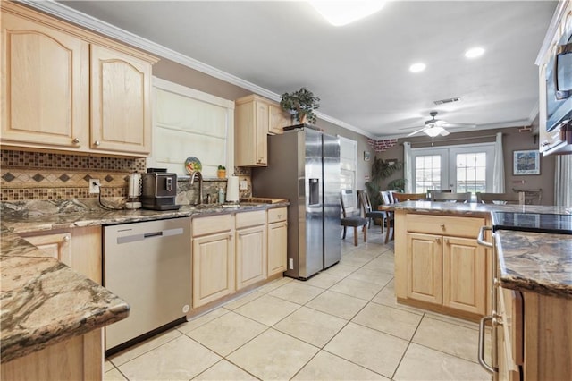 305 Eden Isles Dr, Slidell, LA 70458 - kitchen featuring stainless steel appliances, light brown cabinets, a ceiling fan, crown molding, and recessed lighting