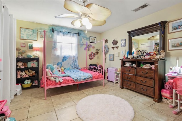 305 Eden Isles Dr, Slidell, LA 70458 - tiled bedroom featuring a ceiling fan