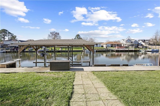 305 Eden Isles Dr, Slidell, LA 70458 - dock with boat lift, a yard, and a water view